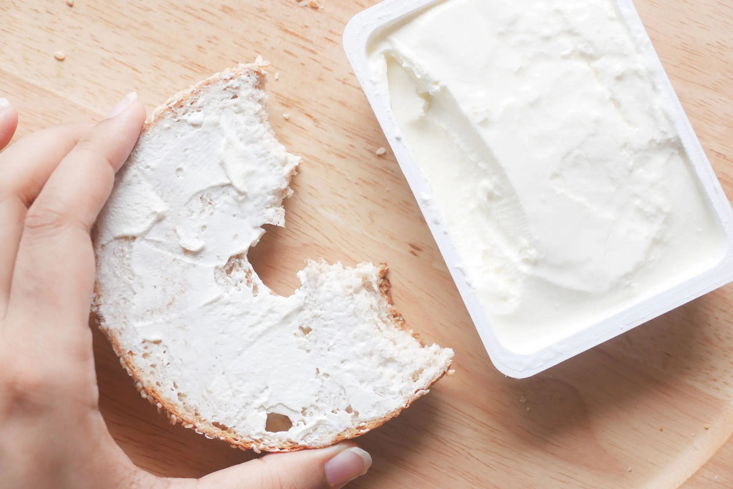 A bagel spread with cream cheese